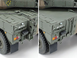 Close-up of a military vehicle model with visible vehicle number on a white background