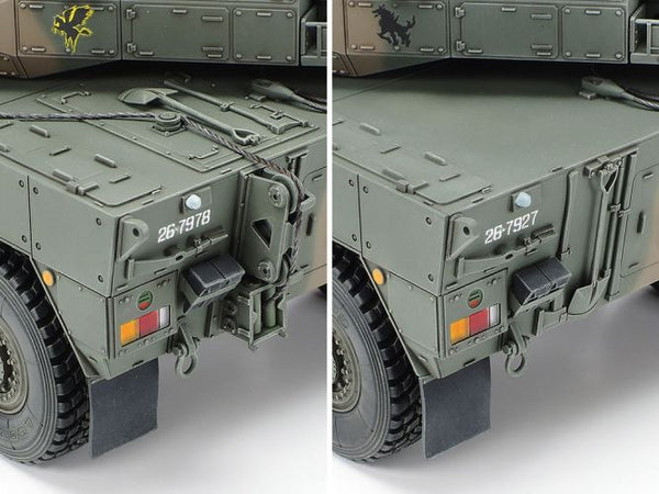 Close-up of a military vehicle model with visible vehicle number on a white background