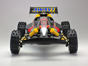 Tamiya Vanquish off-road vehicle with 'AWAY!' banner on a gray background