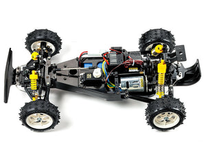 Mechanical model of a Tamiya Vanquish Radio Controlled car on a white background