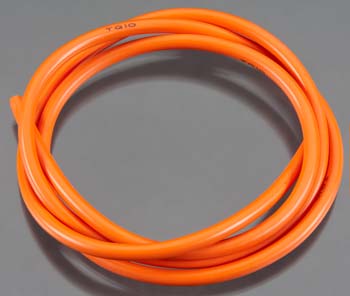 Coiled orange cable on a gray background