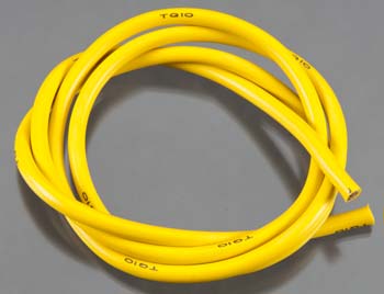 Coiled yellow cable on a gray background