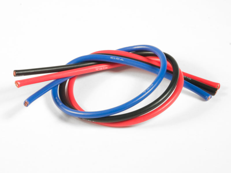 Coiled red, black, and blue wires on a white background