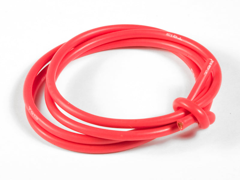 Coiled red cable on a white background
