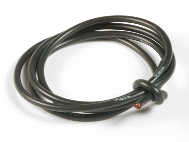 Coiled black cable on a white background