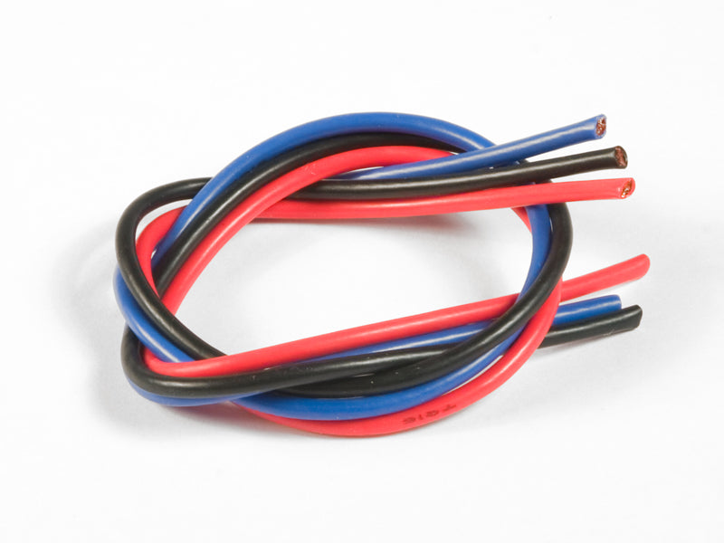 Coiled red, black, and blue wires on a white background