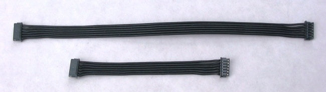 Two black cables on a white background