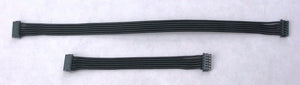 Two black computer cables on a white background