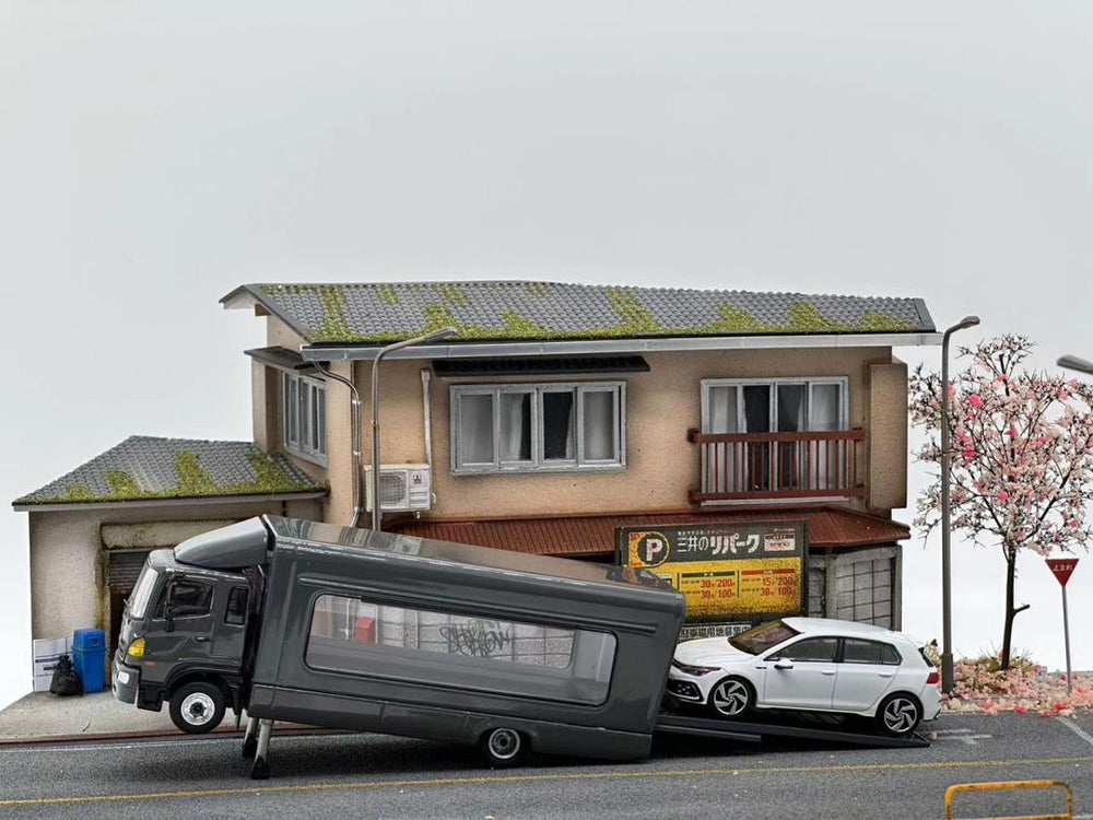 Model of a truck and building with 'LOT57 SUPPLIES' logo on a dark background