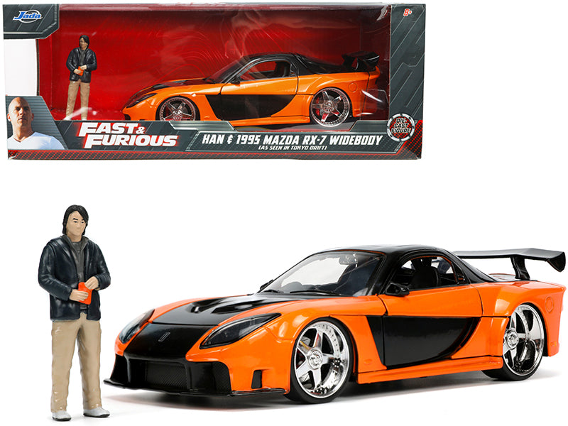 1995 Mazda RX-7 Widebody RHD (Right Hand Drive) Orange Metallic and Black with Han Diecast Figurine "The Fast and the