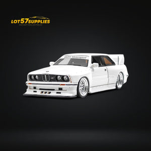 White BMW model car on a black background with 'LOT57SUPPLIES' logo.