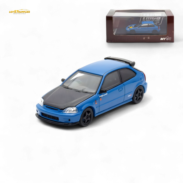 Blue model car with black roof and black wheels on a white background, displayed in front of its packaging.