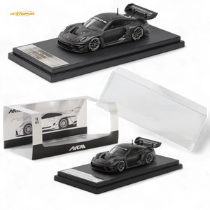 Black sports car model on a display stand with clear acrylic cover