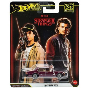 Hot Wheels Pop Culture 2026 - Select Vehicle(s) featuring a detailed 1983 BMW 733i diecast model from Stranger Things, combining collectibles with veteran-owned, STEM-focused family learning.