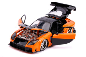 Han's Mazda RX-7 RHD (Right Hand Drive) Orange and Black "Fast & Furious" Movie 1/24 Diecast Model Car by Jada