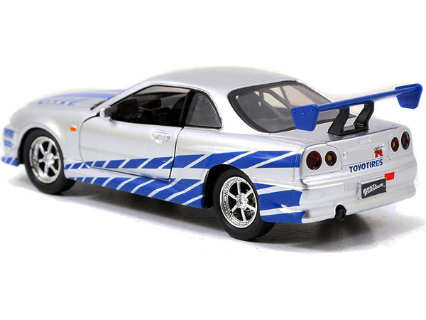 Brian's Nissan Skyline GT-R (R34) RHD (Right Hand Drive) Silver Metallic with Blue Stripes "2 Fast 2 Furious" (2003) Movie "Fast & Furious 25th Anniversary" Series 1/32 Diecast Car Model by Jada