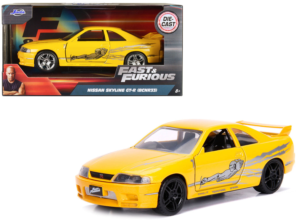 Leon's Nissan Skyline GT-R (BCNR33) Yellow Metallic with Graphics "Fast & Furious" Series 1/32 Diecast Model Car by Jada —