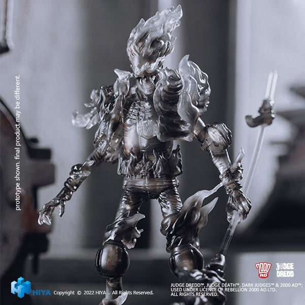 Metallic Judge Dredd action figure with a sword in a blurred indoor setting