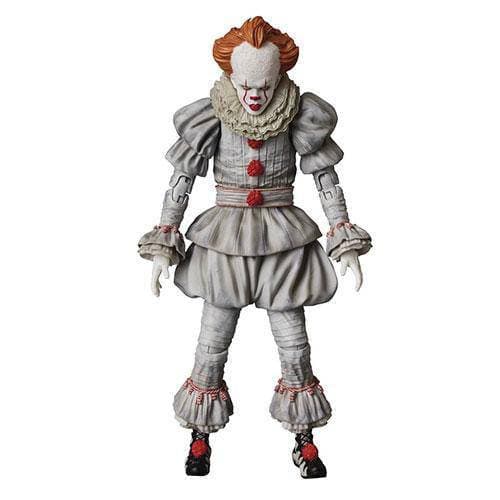 Action figure of a clown with red hair and white face on a white background