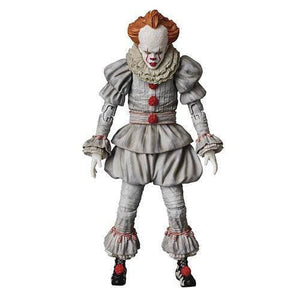 Action figure of a clown with red hair and white face on a white background