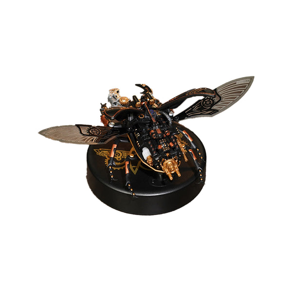 Decorative beetle figurine with intricate details on a white background