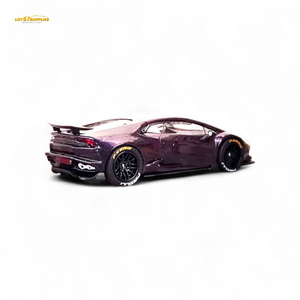 Model car with a glossy purple finish on a white background