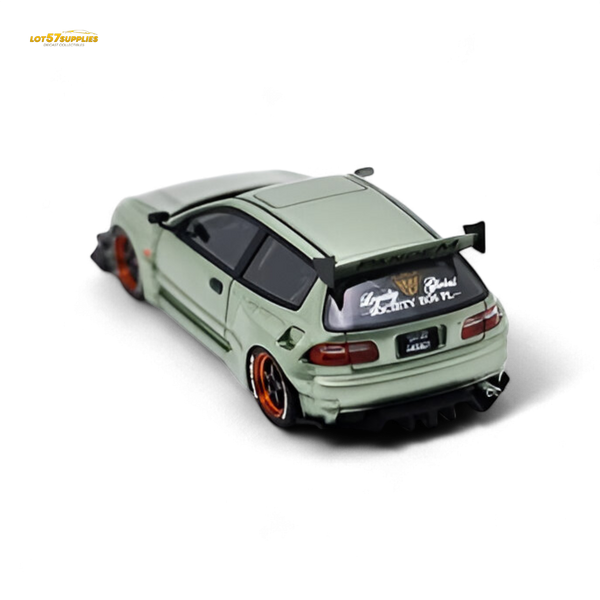 Model car with a large rear wing on a white background